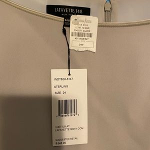 slate colored boat neck dress with pretty lines